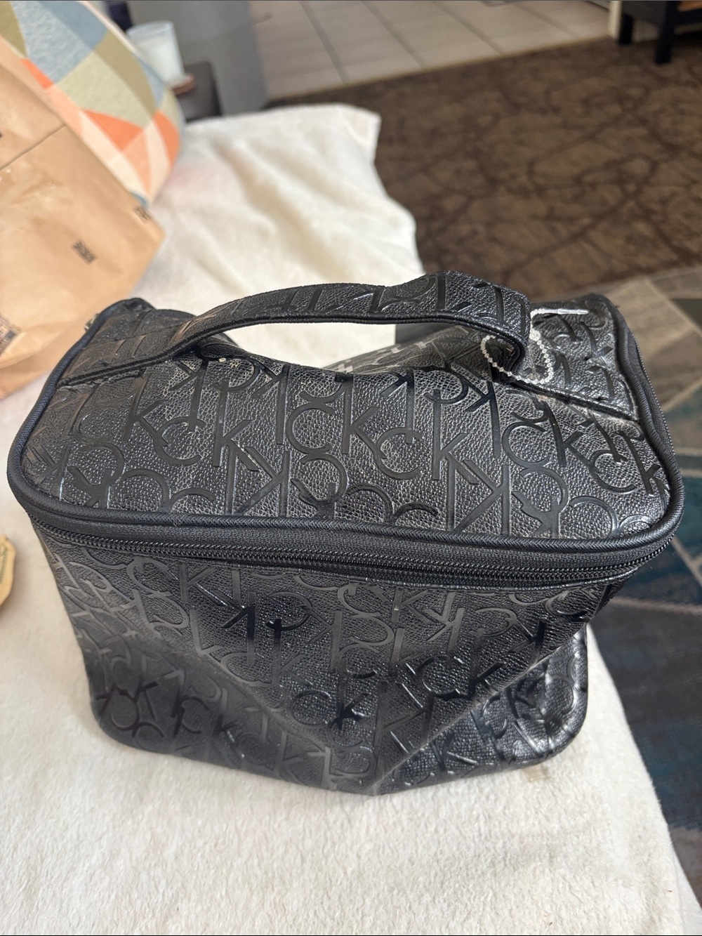 Calvin Klein Black Embossed Logo Cosmetic Case with Top Handle